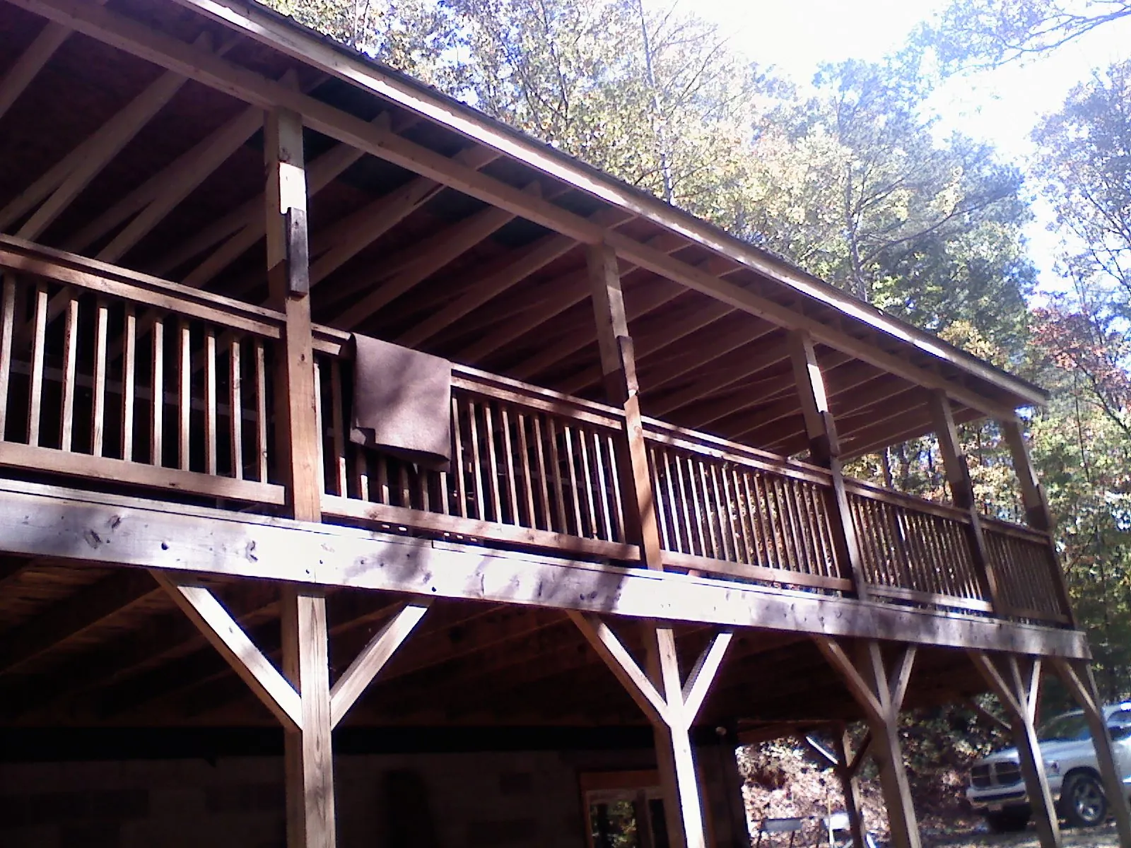 Timber framing under a new elevated porch and deck — Roof Leak Repair in Loganville by Roofing Brothers